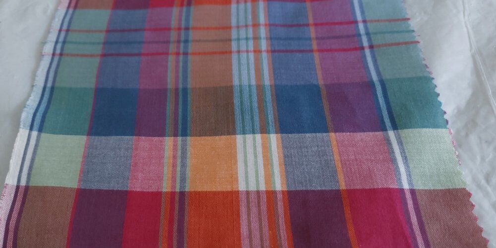 Bleeding Madras Fabric woven with yarns dyed naturally, for vintage menswear like shirts, pants, ties and bowties & dresses.