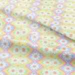 Novelty fabric with Flowers and bright colors, for shirts, skirts, bowties, children's clothing & dog bows and bandanas.