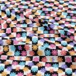 Novelty fabric with floral print & geometric squares print in bright colors, for shirts, skirts, bowties, & dog bandanas.