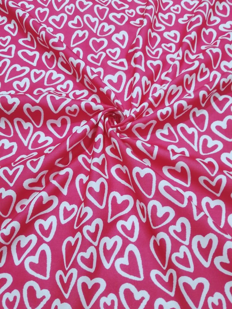 Novelty fabric with white hearts print, on bright pink, for quilting, skirts, bowties, children's clothing & dog and bandanas.