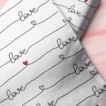 Love Words print fabric with hearts printed for handsewn children's clothing, dog bandanas & bows, bowties and etsy crafts.