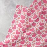 Hearts print fabric with peach and pink hearts, for sewing dog bows and bandanas, ties & bowties, quilting, and vintage dresses.