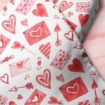 Novelty print fabric with love letters & hearts printed for dog bandanas, bows, vintage clothing & classic children's clothing.