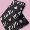 Novelty fabric with XoXo and hearts print, for quilting, skirts, bowties, children's clothing & dog bows and bandanas.