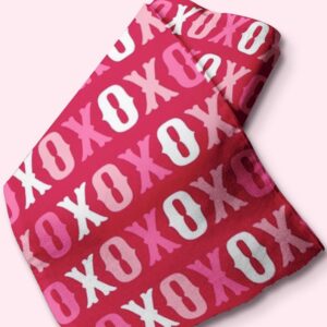 Novelty fabric with xoxo print, in bright colors, for quilting, skirts, bowties, children's clothing & dog and bandanas.