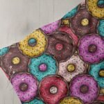 Novelty fabric with donuts print, for skirts and dresses, bows, handmade children's clothing, handmade crafts & bandanas.