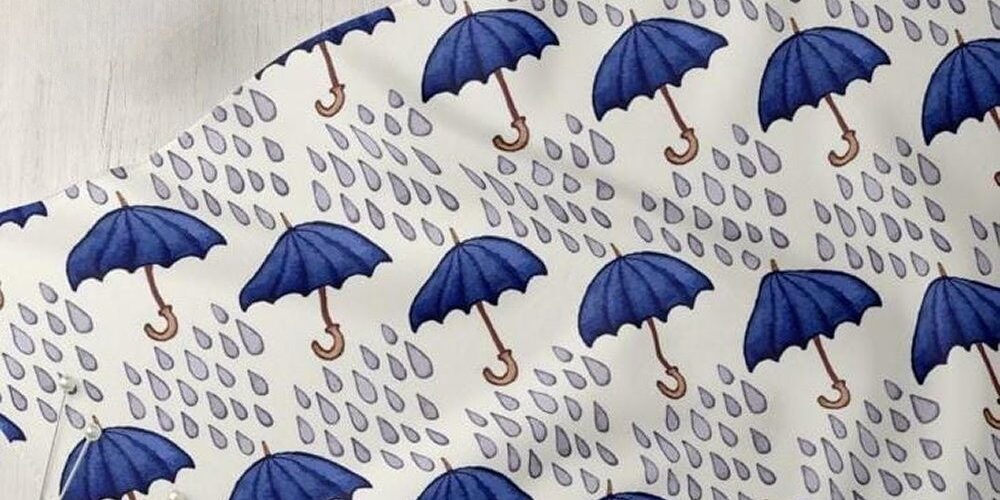 Umbrellas & Raindrops print fabric, for sewing dog bows and bandanas, ties & bowties, skirts, dresses, handbags & quilting.