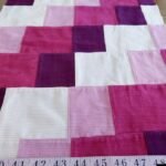 Corduroy patchwork fabric with for use in men's jackets, corduroy pants, winter clothing, shorts & jackets, and for hats and caps.