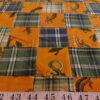 Patchwork fabric with lizard print patches & madras plaid, for children's clothing, skirts, dresses, bows & dog bandanas.