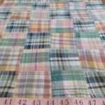 Patchwork Madras or patchwork plaid - a preppy fabric made of plaid fabric of various colors, for preppy children's & men's clothing.