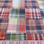 Patchwork Madras or patchwork plaid - a preppy fabric made of plaid fabric of various colors, for preppy children's & men's clothing.