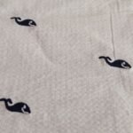 Nautical Theme - Embroidered Whales On Seersucker Fabric, for sewing children's clothing, dog bandanas, bowties & shorts.