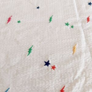 Embroidered stars & thunder bolts on seersucker fabric, for children's clothing, dog bandanas, bowties, skirts and dresses.