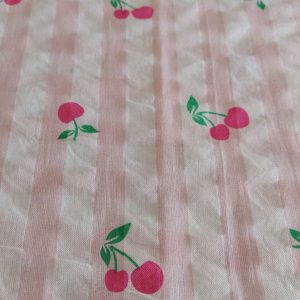 Cherries Print Seersucker gingham fabric for classic children's clothing, retro & pinup clothing, skirts & dresses, and decor.