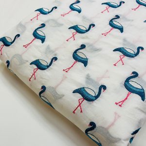 Embroidered blue flamingos cotton fabric, for sewing children's clothing, costumes, dog bandanas, shirts & tops and dresses.