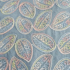 Embroidered leaf motifs denim fabric, for sewing children's clothing, dog bandanas, coats, jackets, pants & skirts and dresses.